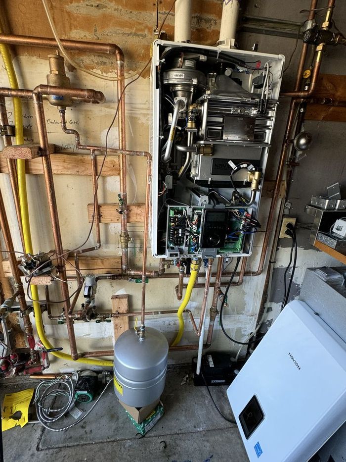 Tankless water heater installed with full copper & gas line work